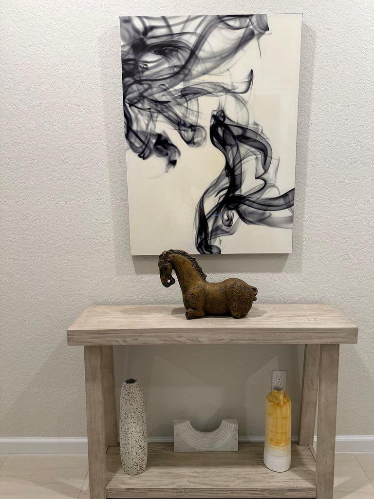 13897 Southwest Gingerline Drive Port St. Lucie, FL 34987 - Photo 48 of 74 a bathroom with a sink and a mirror