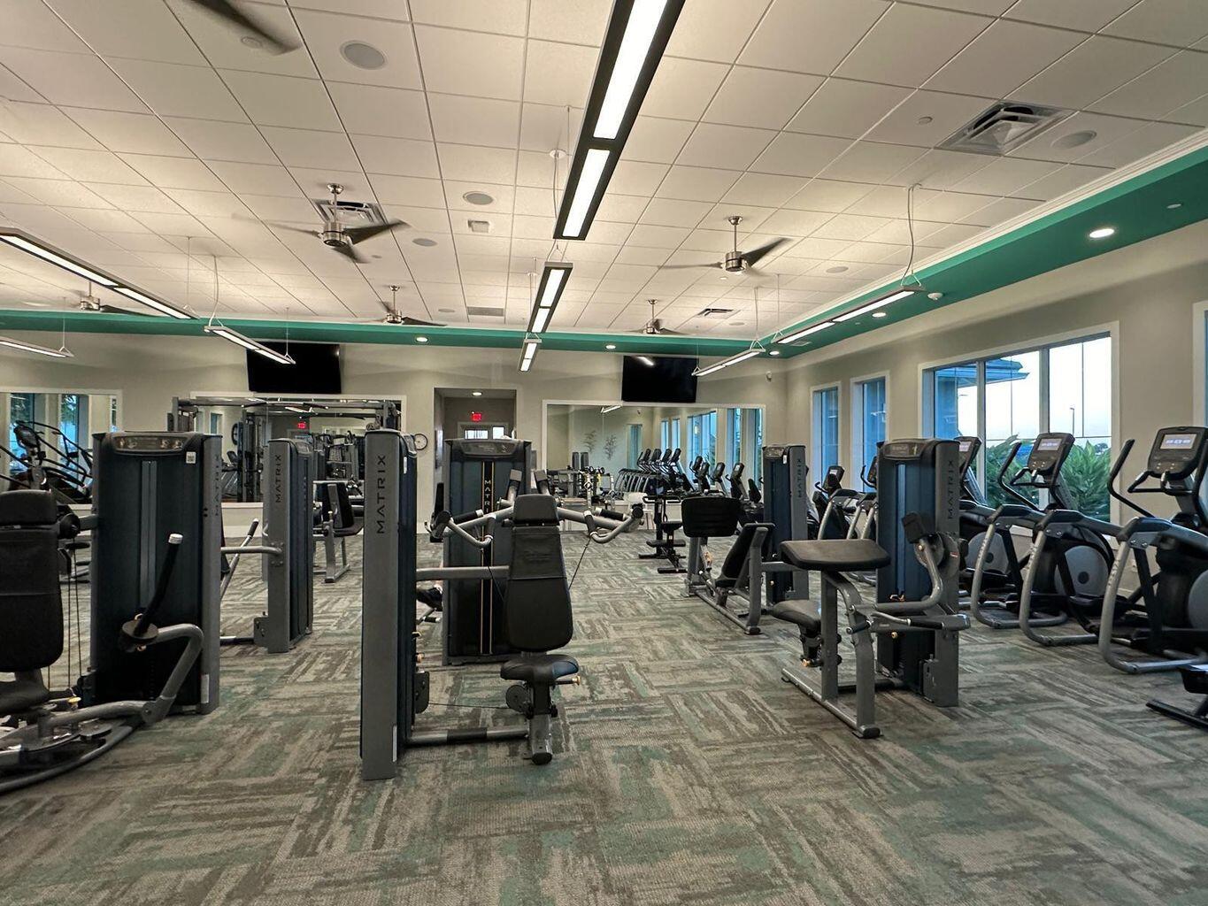 13897 Southwest Gingerline Drive Port St. Lucie, FL 34987 - Photo 70 of 74 a view of a room with gym equipment
