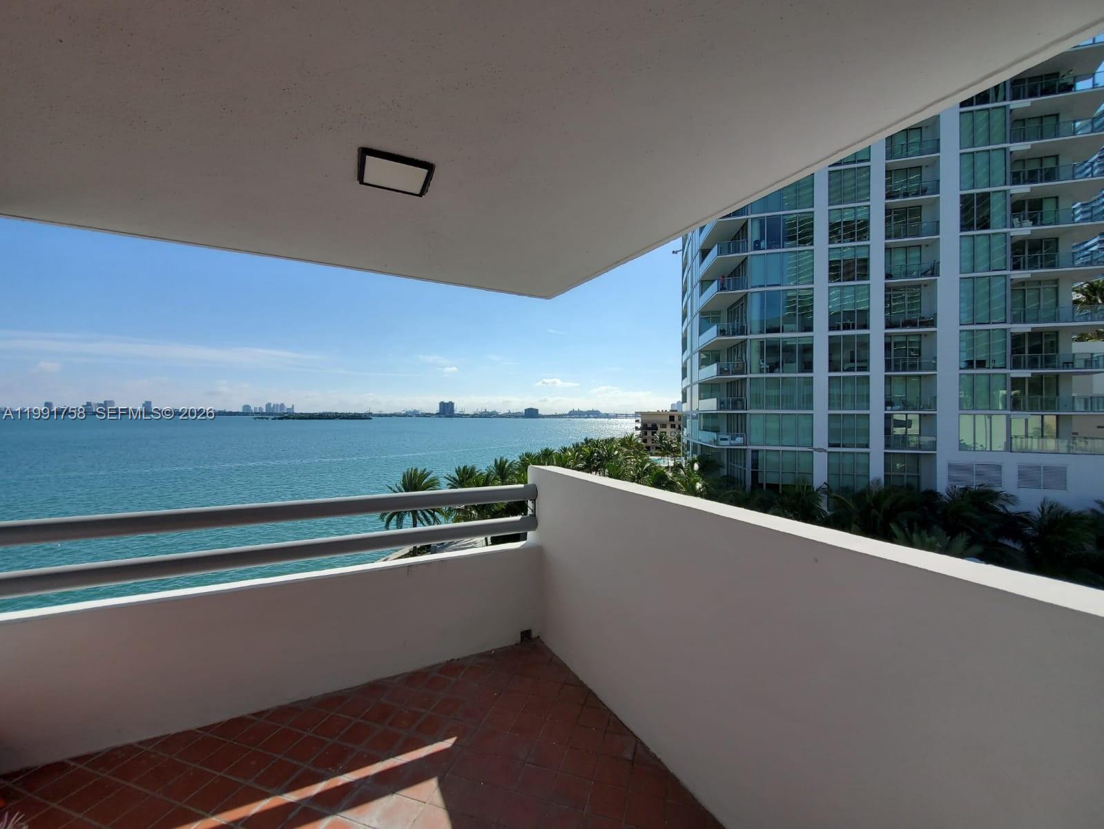 555 Northeast 30th Street, Unit 502 Miami, FL 33137 - Photo 1 of 19 a view of a building from a balcony