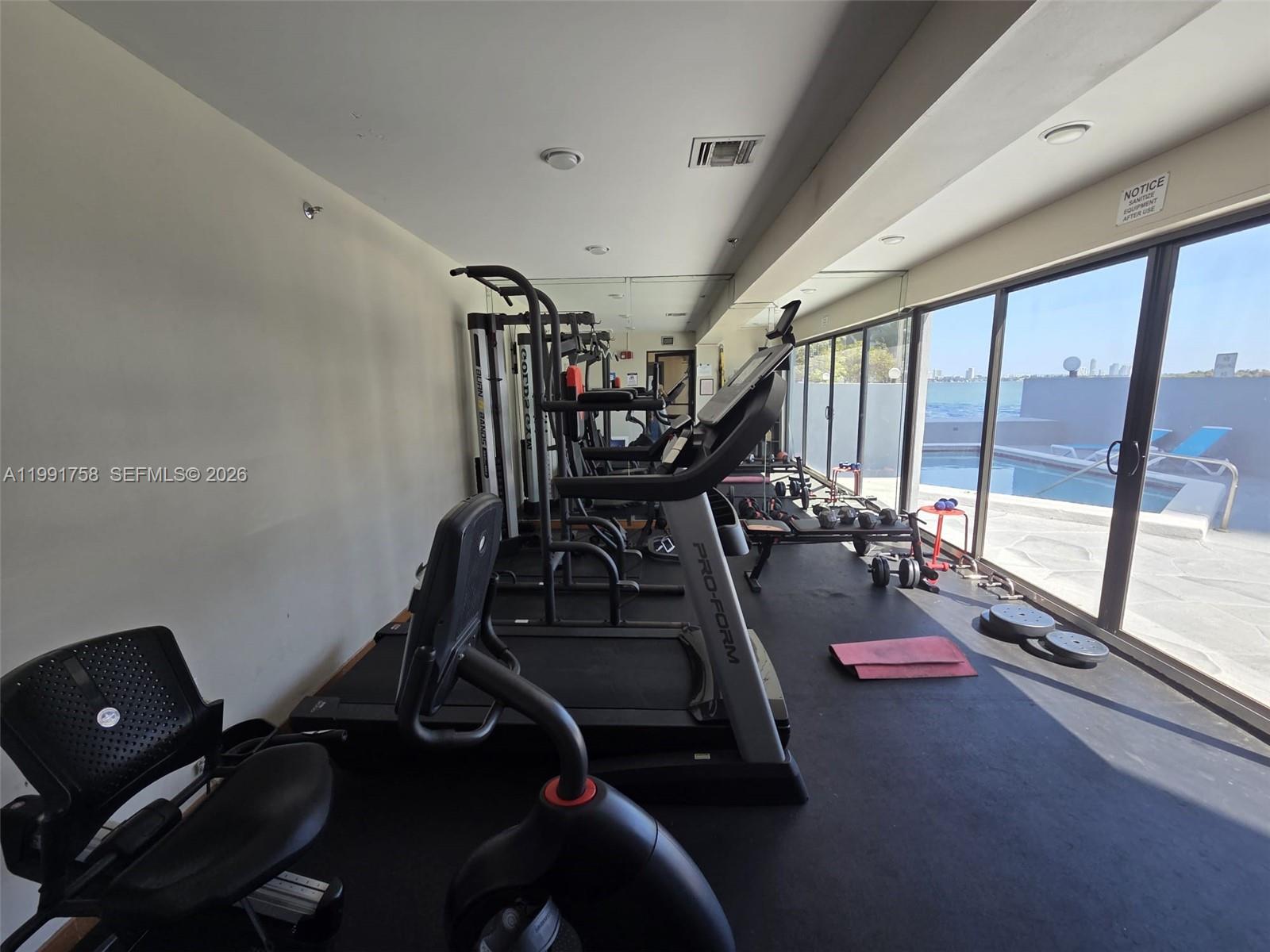 555 Northeast 30th Street, Unit 502 Miami, FL 33137 - Photo 19 of 19 a view of a room with gym equipment