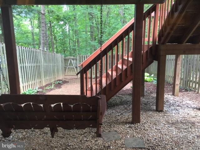 10320 Apple Ridge Road Gaithersburg, MD 20886 - Photo 25 of 30 a view of entryway with wooden stairs