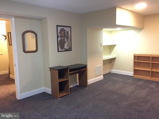 10320 Apple Ridge Road Gaithersburg, MD 20886 - Photo 29 of 30 a view of an empty room with a window