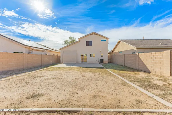 a view of a backyard of a house