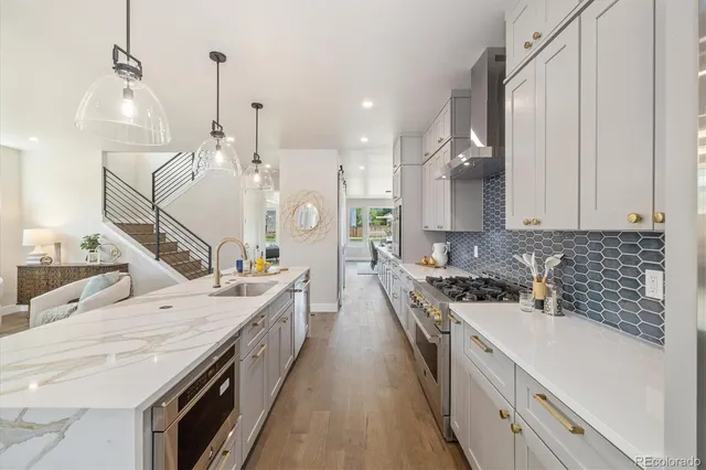 a front view of a house with a yard table and chairs