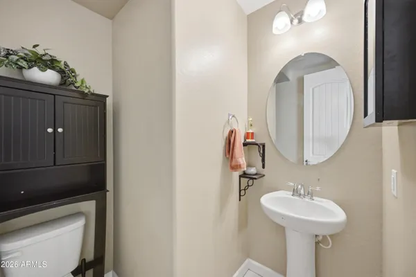 a view of a livingroom with furniture and a flat screen tv