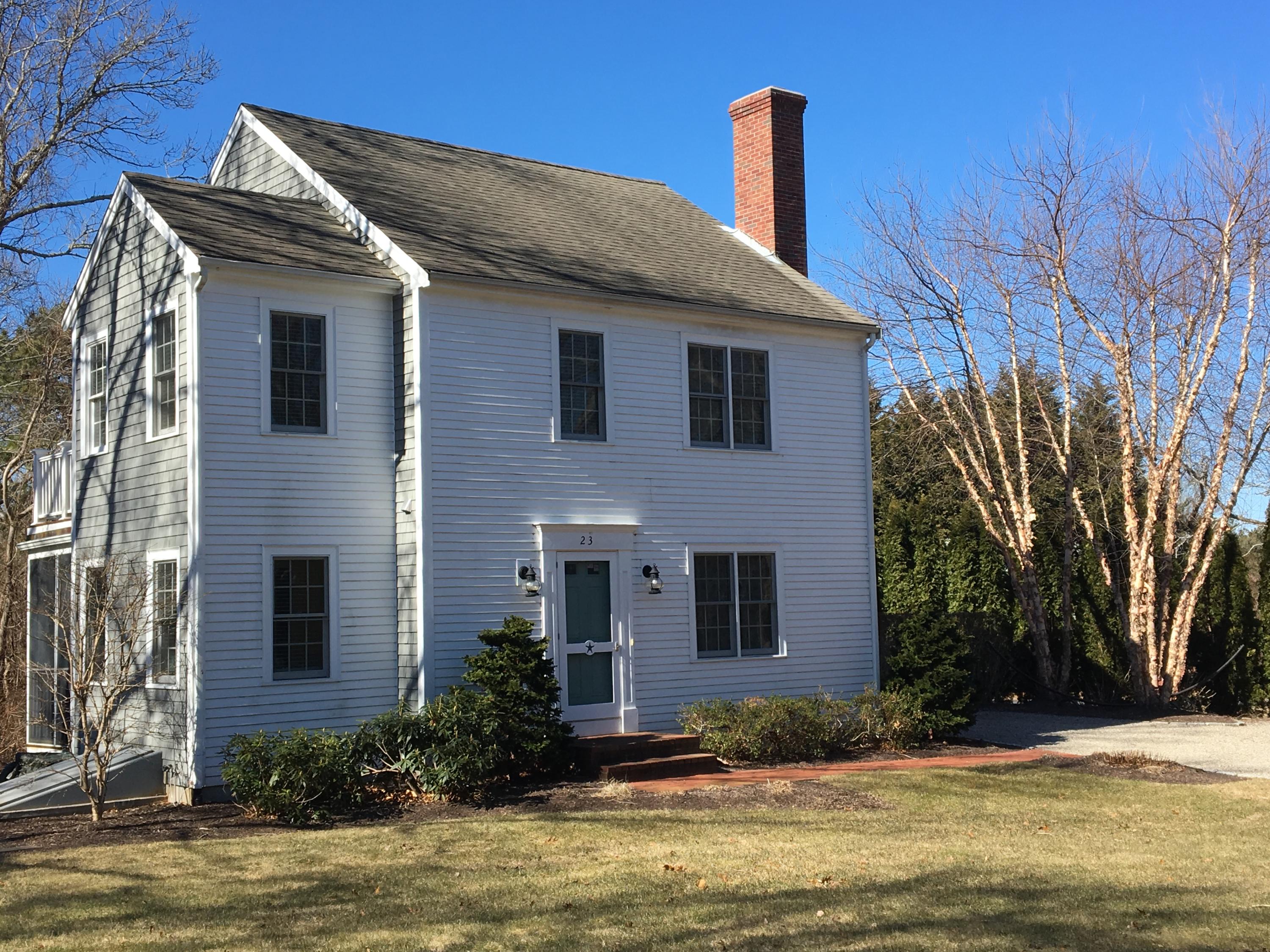 23 Torrey Road East Sandwich, MA 02537 - Photo 1 of 25 a front view of house with yard