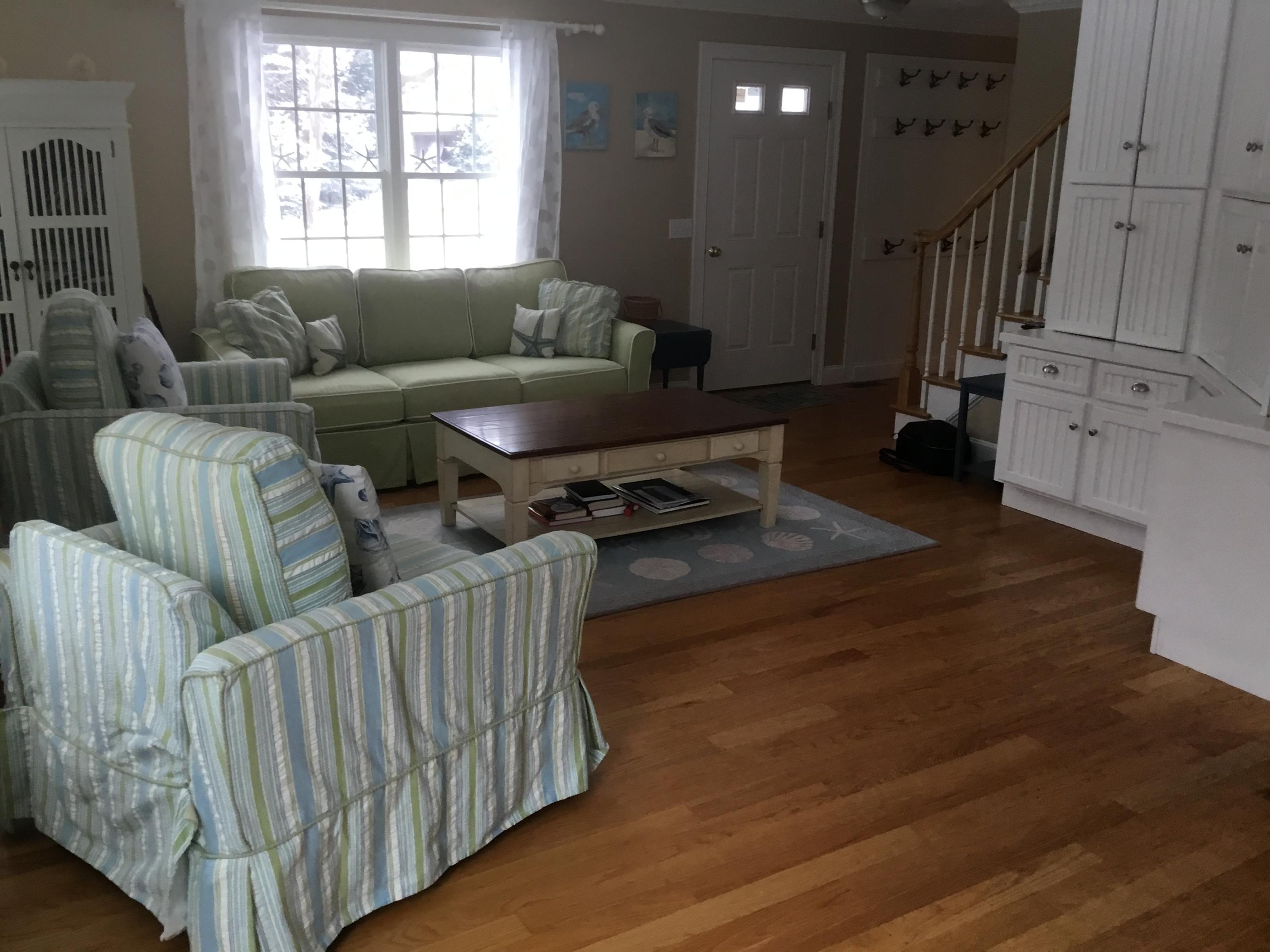 23 Torrey Road East Sandwich, MA 02537 - Photo 6 of 25 a living room with furniture and wooden floor