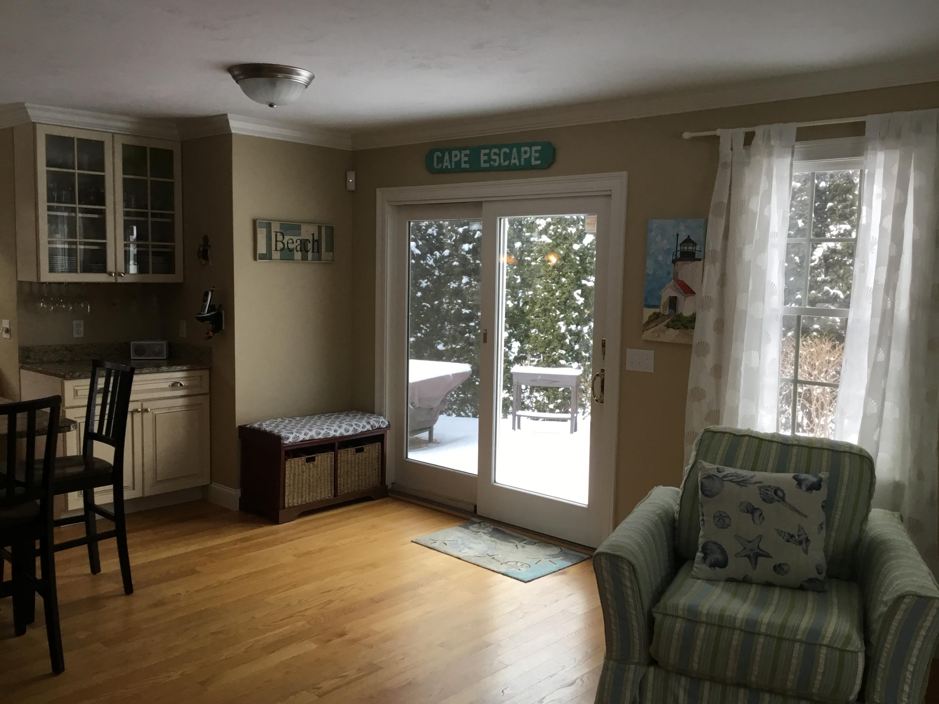 23 Torrey Road East Sandwich, MA 02537 - Photo 9 of 25 a living room with furniture and windows