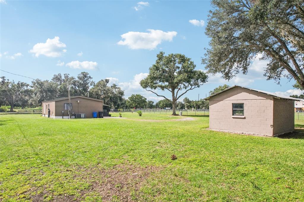 4708 Gallagher Road Plant City, FL 33565 - Photo 11 of 62 a front view of house with yard and green space