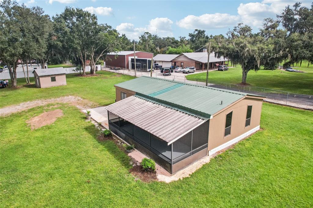 4708 Gallagher Road Plant City, FL 33565 - Photo 16 of 62 a view of a house with a yard and sitting area