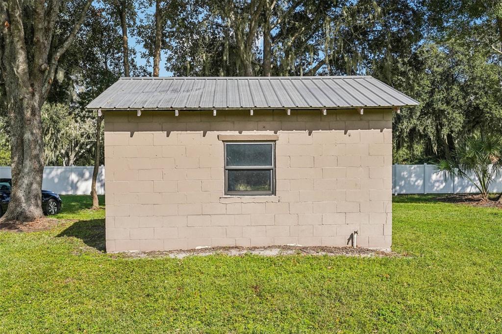4708 Gallagher Road Plant City, FL 33565 - Photo 21 of 62 a view of a house with a yard