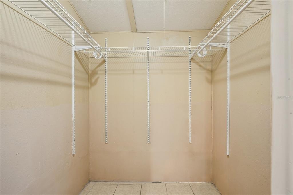 4708 Gallagher Road Plant City, FL 33565 - Photo 28 of 62 a bathroom with a glass door shower