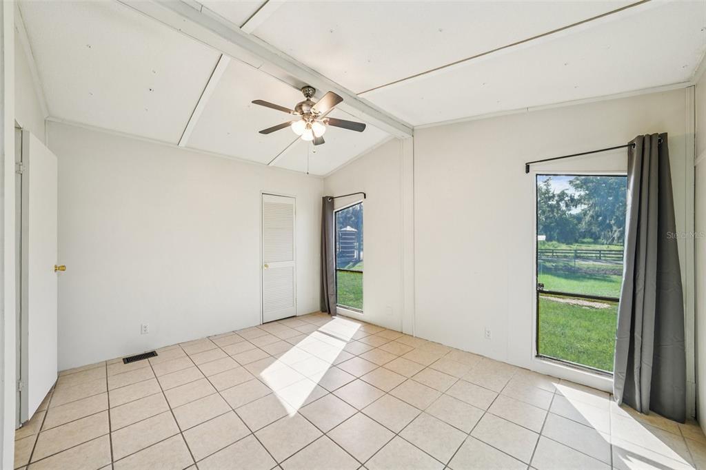4708 Gallagher Road Plant City, FL 33565 - Photo 32 of 62 a view of an empty room with a window