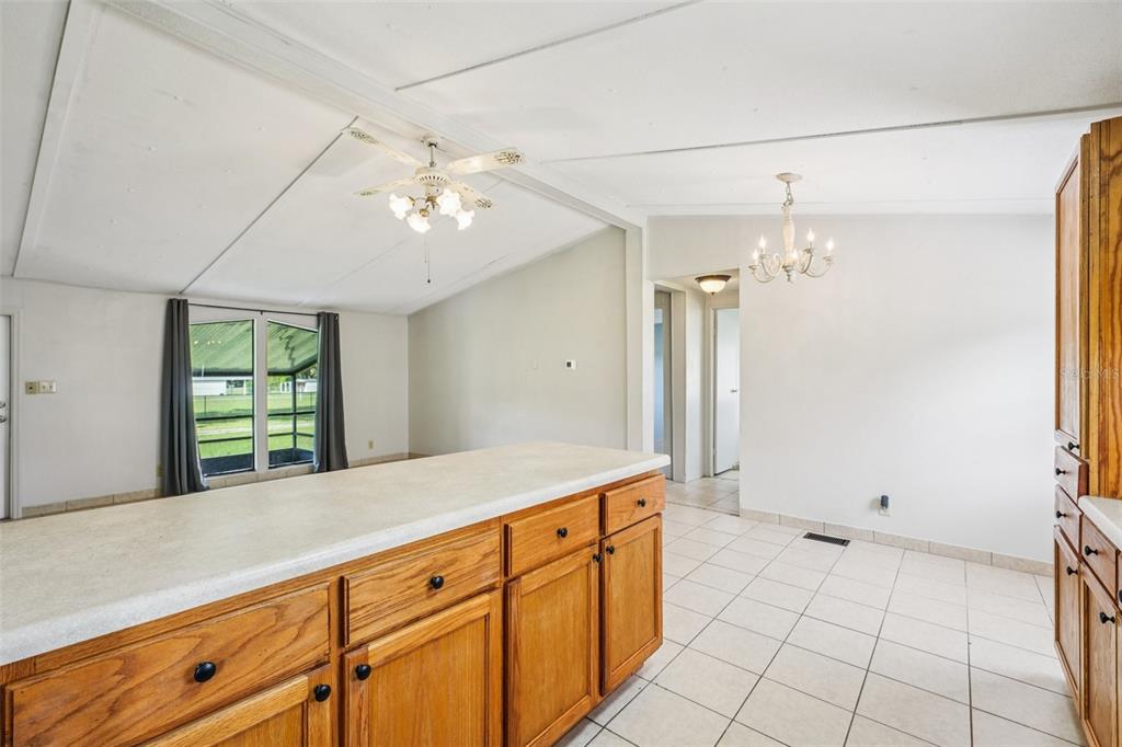 4708 Gallagher Road Plant City, FL 33565 - Photo 46 of 62 a spacious bathroom with a granite countertop sink a mirror and shower