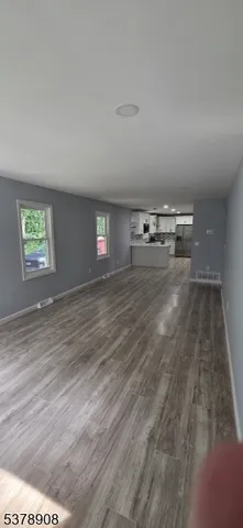 a view of a livingroom with a window