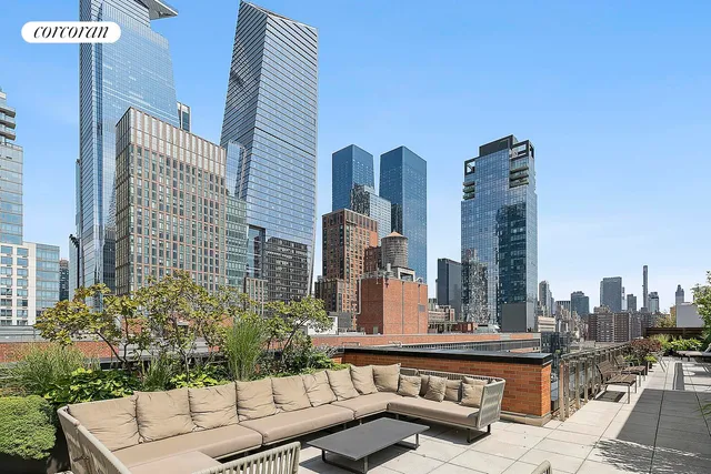 a view of a city with tall buildings