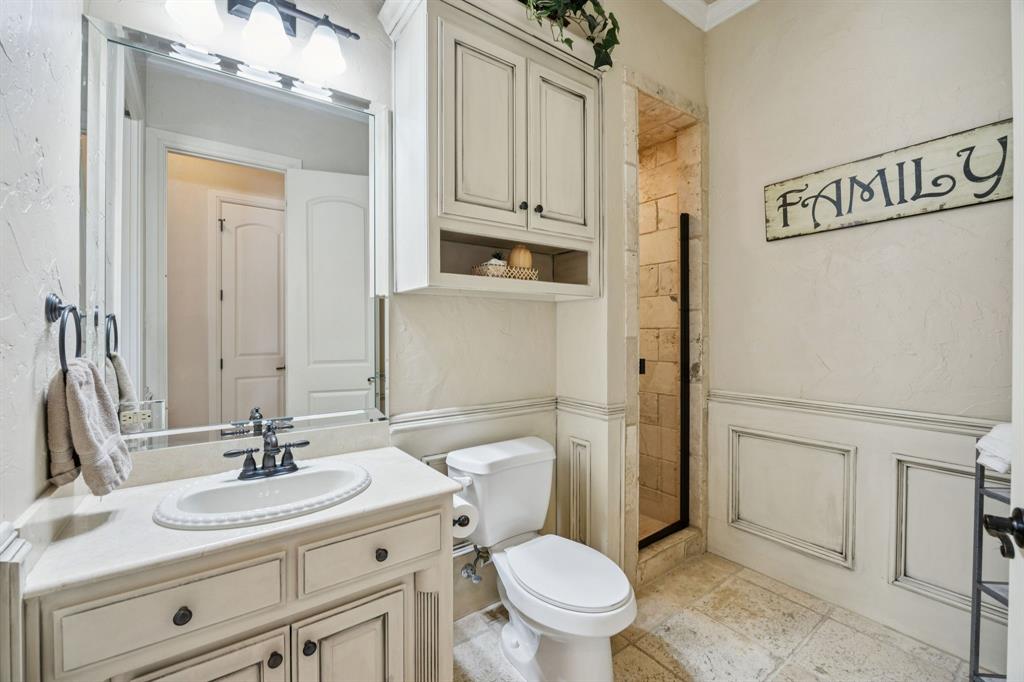 1411 Long And Winding Road Mansfield, TX 76063 - Photo 16 of 37 guest bedroom downstairs bathroom also entry from hallway