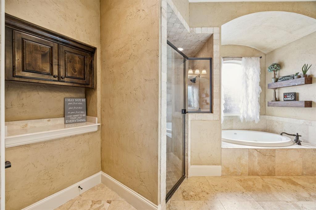 1411 Long And Winding Road Mansfield, TX 76063 - Photo 21 of 37 primary bathroom