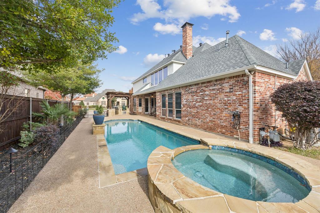 1411 Long And Winding Road Mansfield, TX 76063 - Photo 37 of 37 pool looking from hot tub to the outdoor kitchen