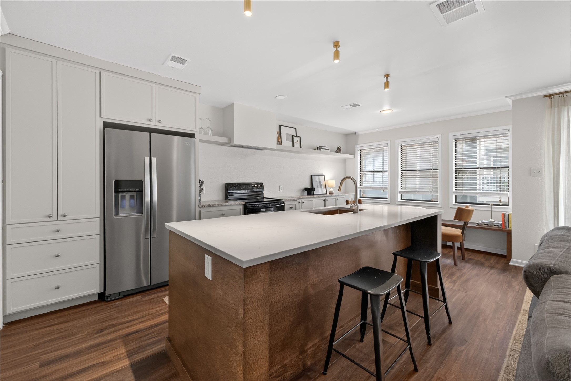 3845 Ranch Road 2222, Unit T2 Austin, TX 78731 - Photo 8 of 34 Kitchen counter seating, open concept kitchen and great light!