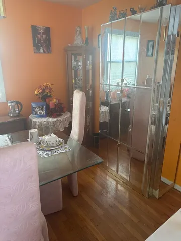 a view of a kitchen with furniture and a rug