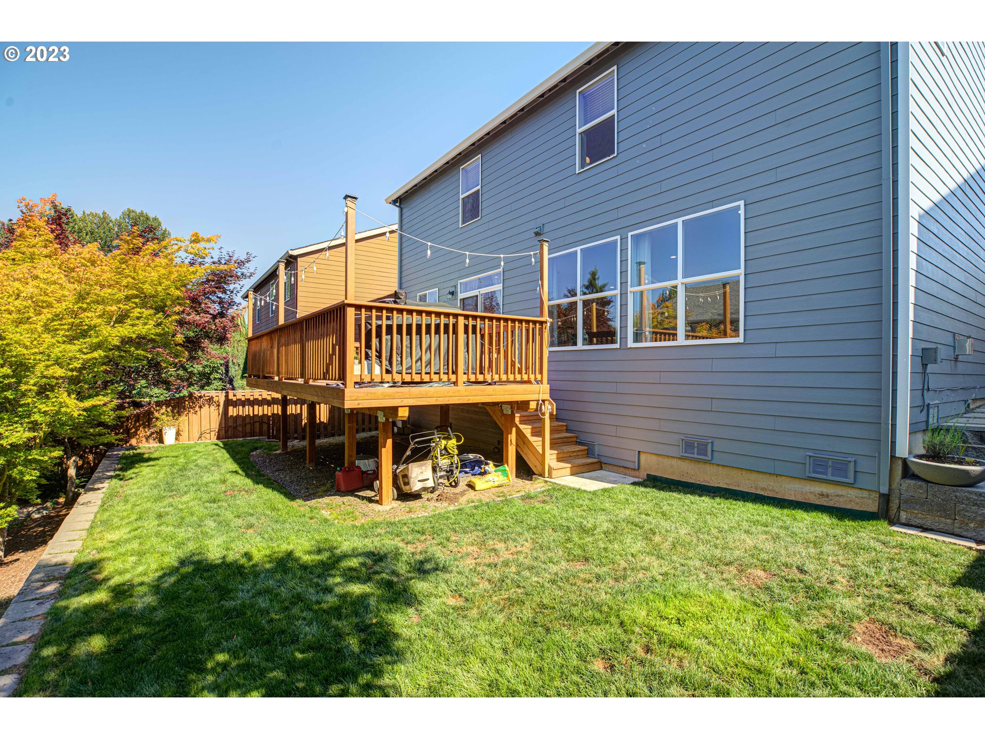 6055 Southeast 28th Street Gresham, OR 97080 - Photo 11 of 48 a view of a house with a yard porch and sitting area