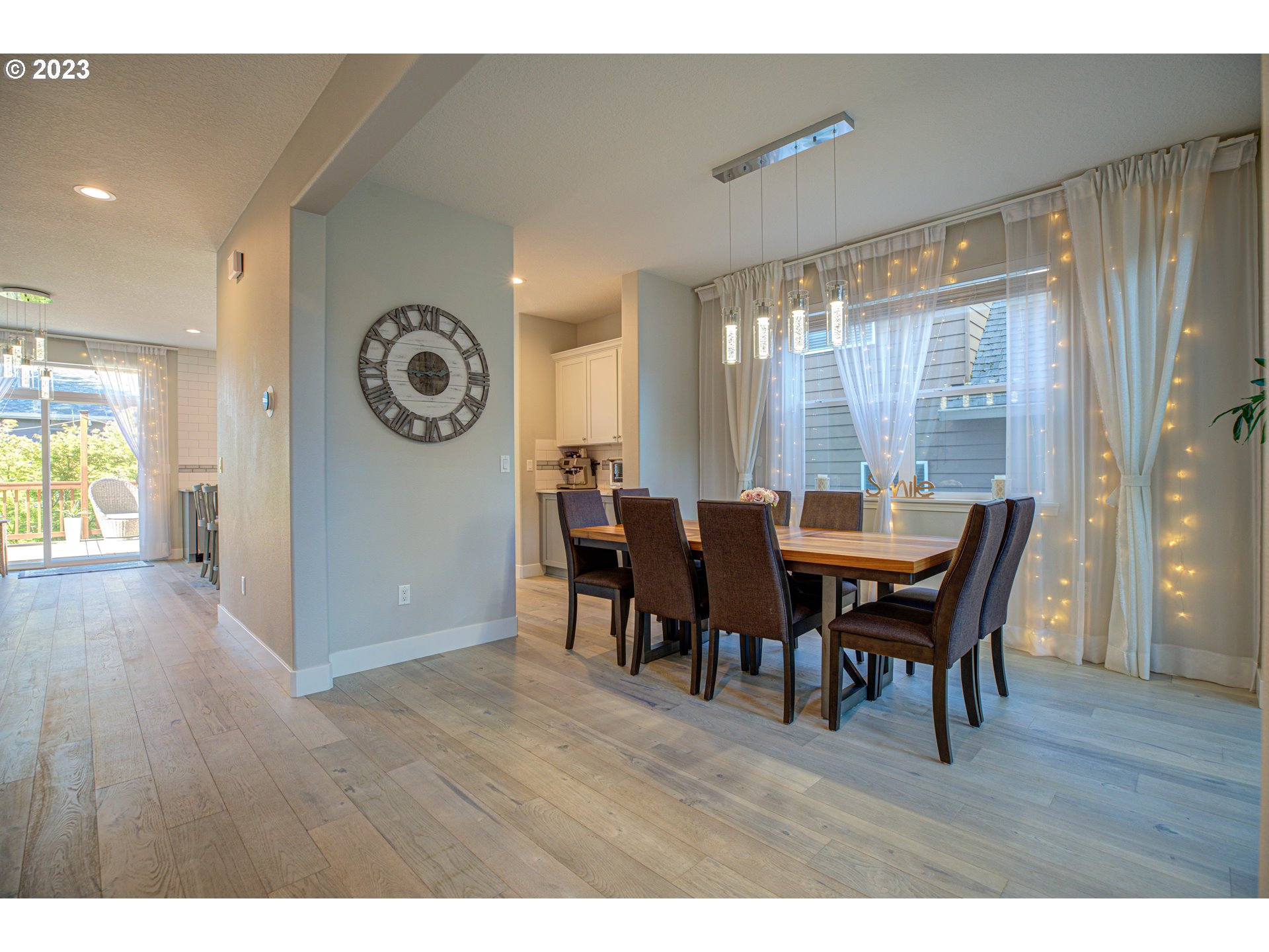 6055 Southeast 28th Street Gresham, OR 97080 - Photo 18 of 48 a view of a dining room with furniture and wooden floor