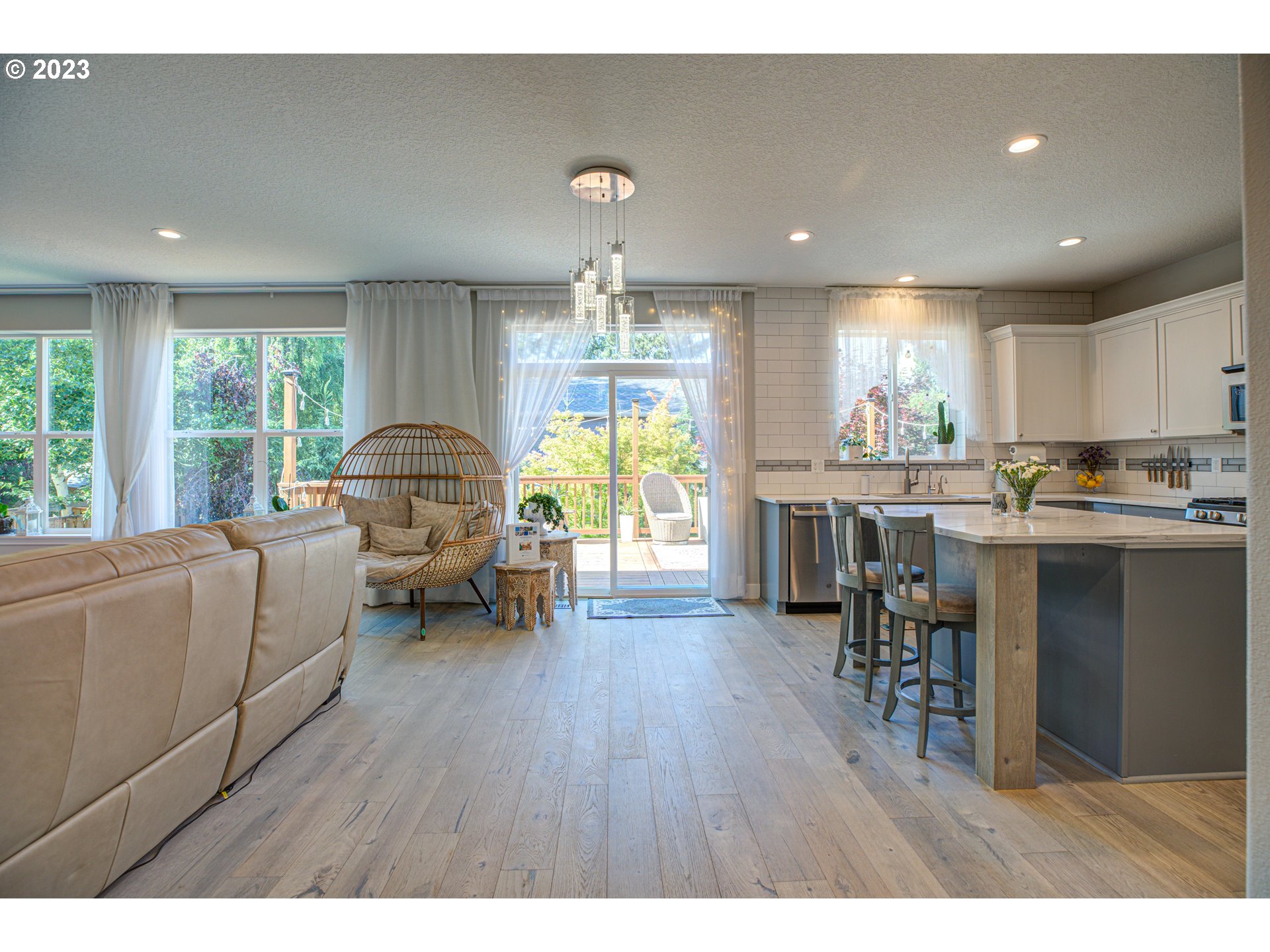 6055 Southeast 28th Street Gresham, OR 97080 - Photo 21 of 48 a living room with furniture and a large window