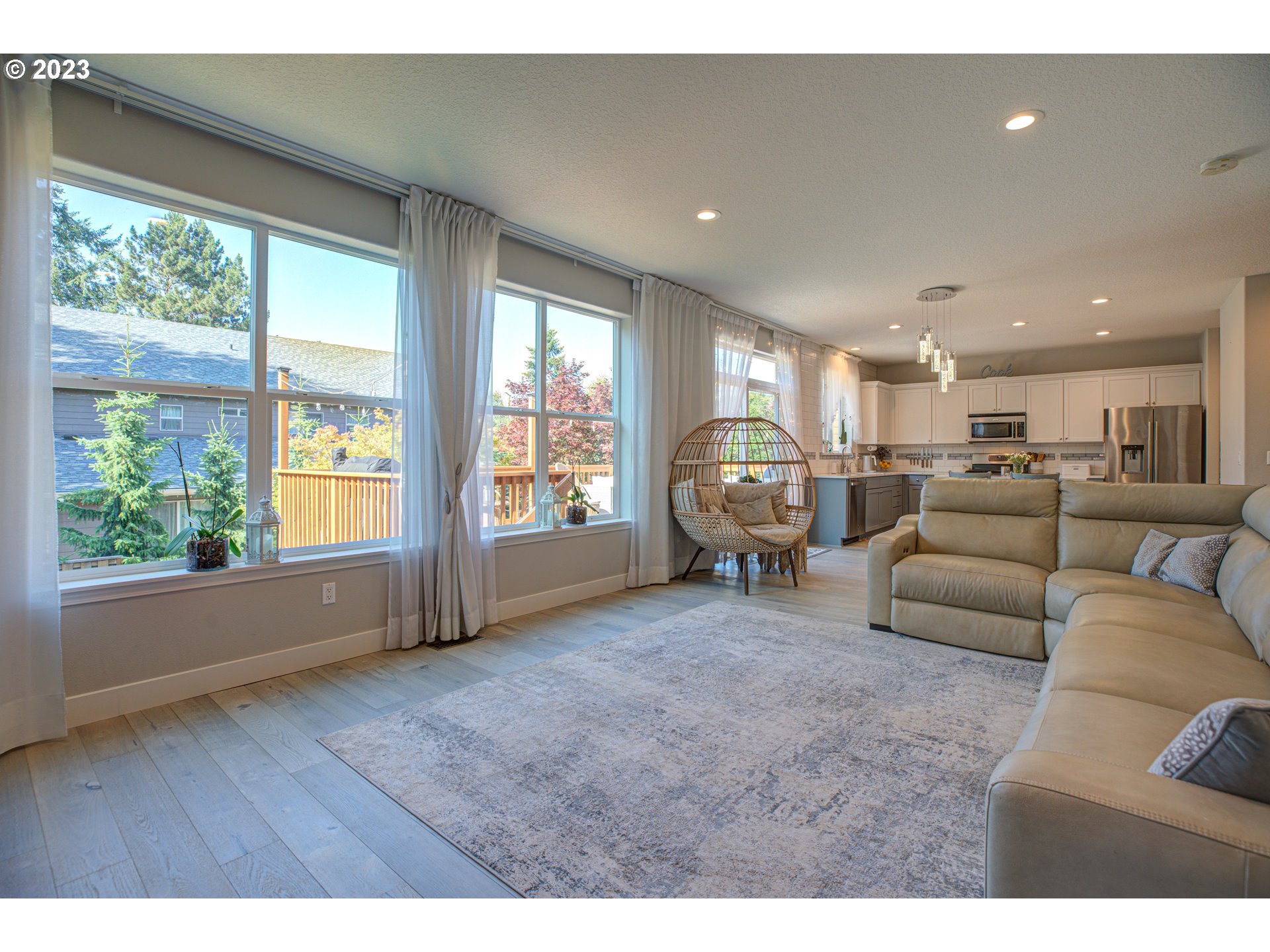 6055 Southeast 28th Street Gresham, OR 97080 - Photo 30 of 48 a living room with furniture and a large window