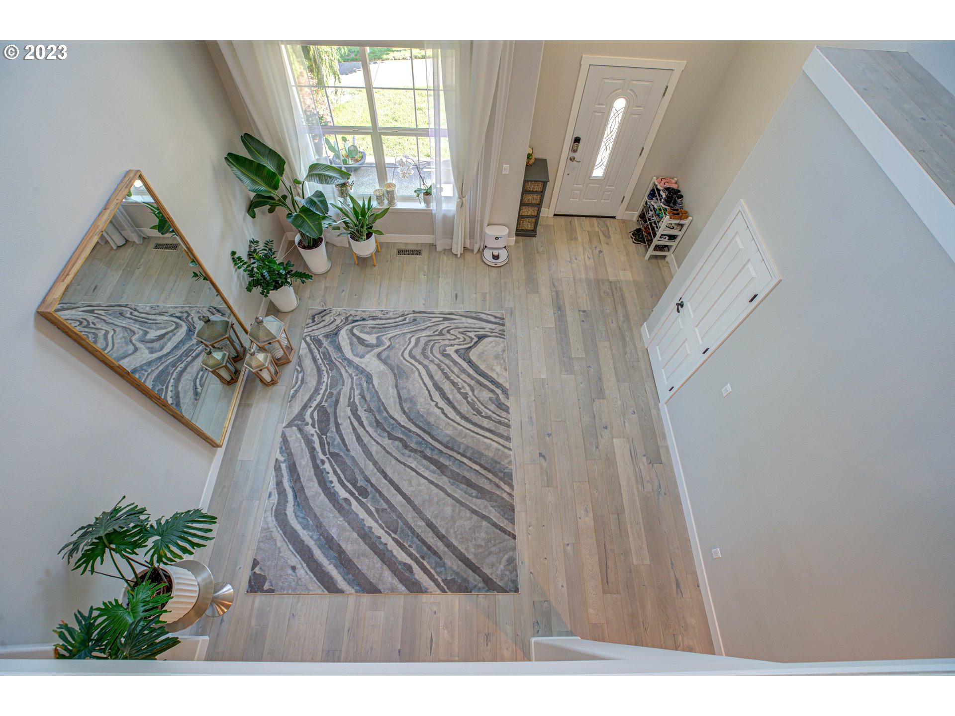 6055 Southeast 28th Street Gresham, OR 97080 - Photo 35 of 48 a living room with furniture and a floor to ceiling window