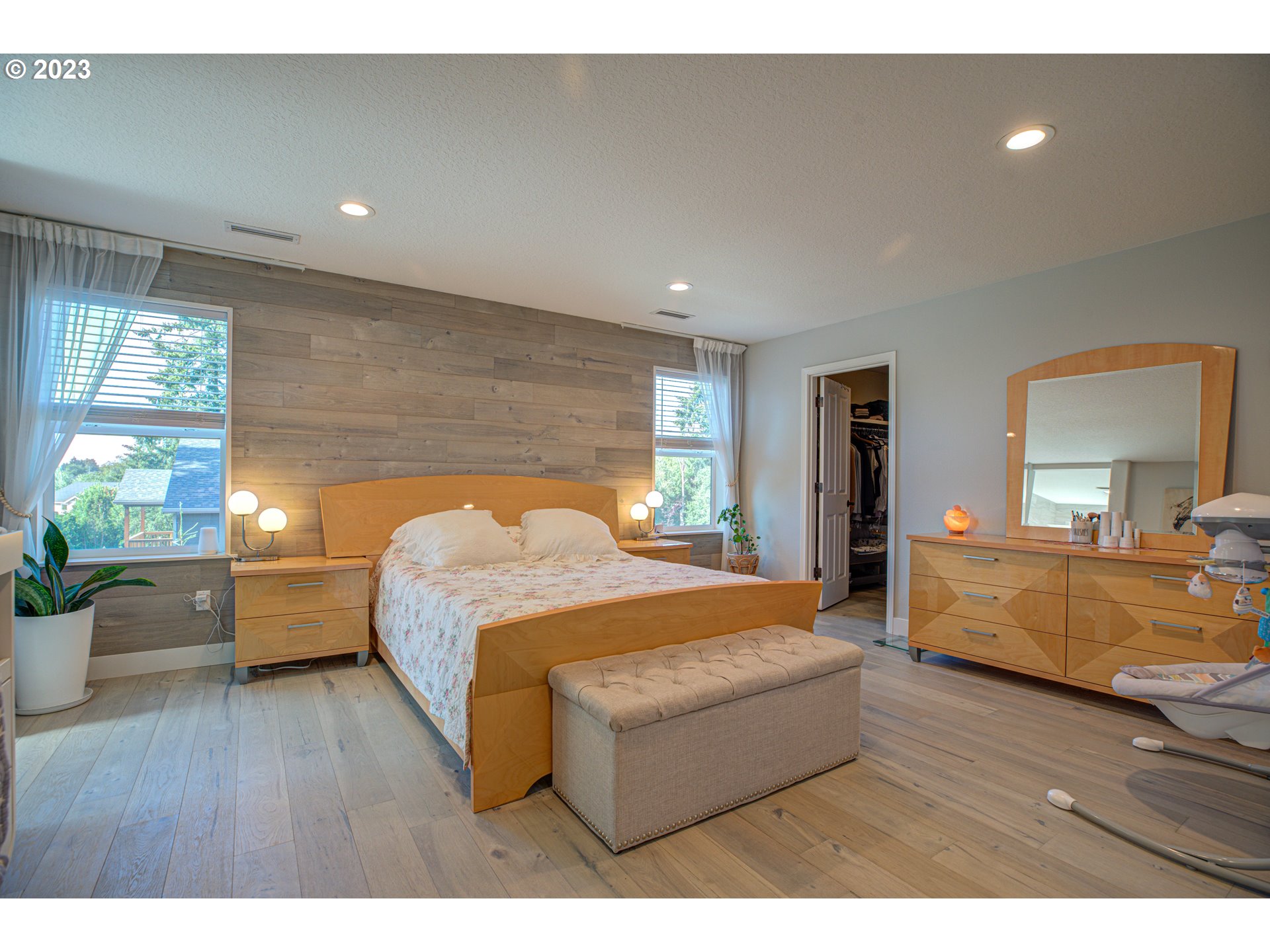 6055 Southeast 28th Street Gresham, OR 97080 - Photo 36 of 48 a living room with furniture and a wooden floor