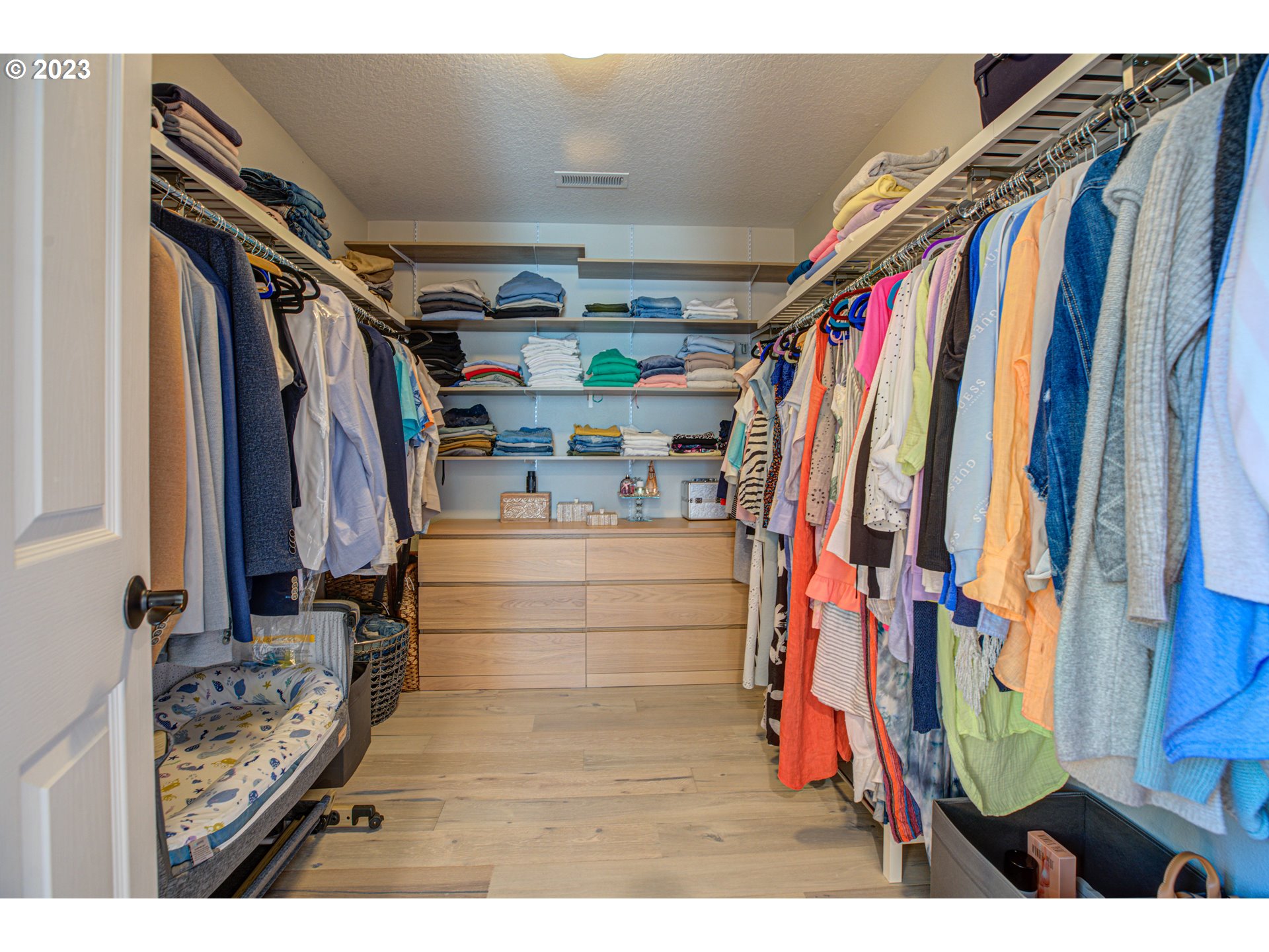 6055 Southeast 28th Street Gresham, OR 97080 - Photo 37 of 48 a view of walk in closet with clothes and shoes