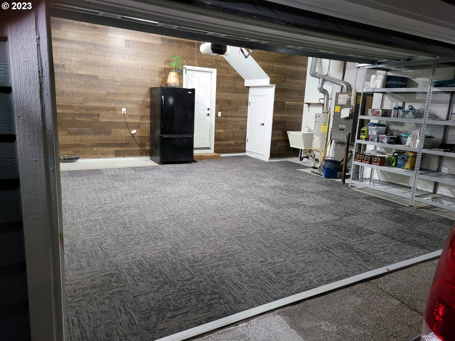 6055 Southeast 28th Street Gresham, OR 97080 - Photo 45 of 48 a view of water heater room with wooden floor