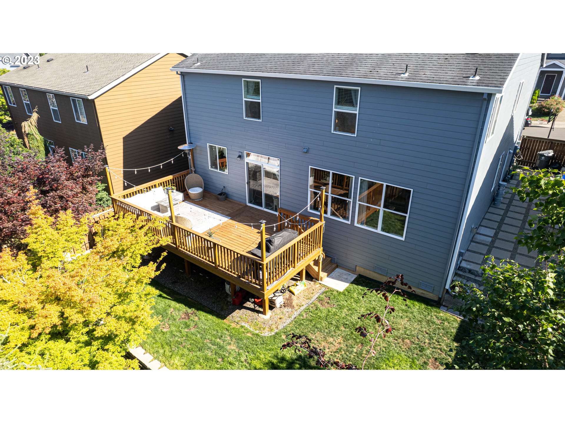 6055 Southeast 28th Street Gresham, OR 97080 - Photo 5 of 48 a aerial view of a house with a yard and trees