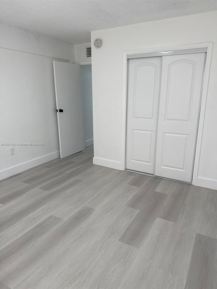 1000 West 28th Street, Unit 16 Hialeah, FL 33010 - Photo 11 of 13 a view of an empty room
