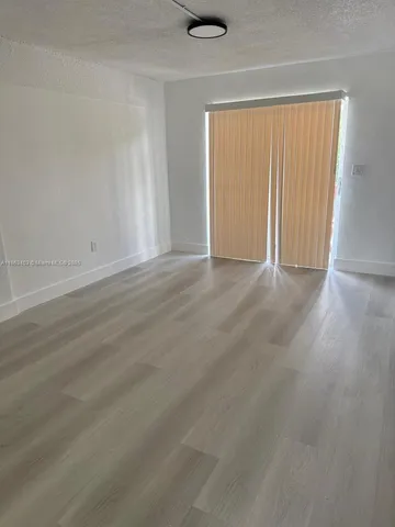 an empty room with a natural light