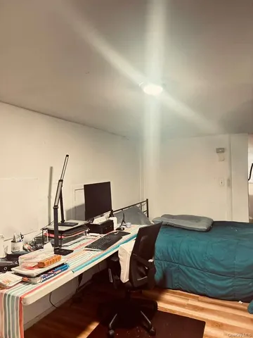 a view of a workspace with furniture