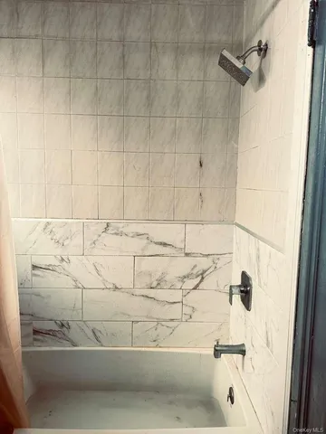 a bathroom with a bathtub