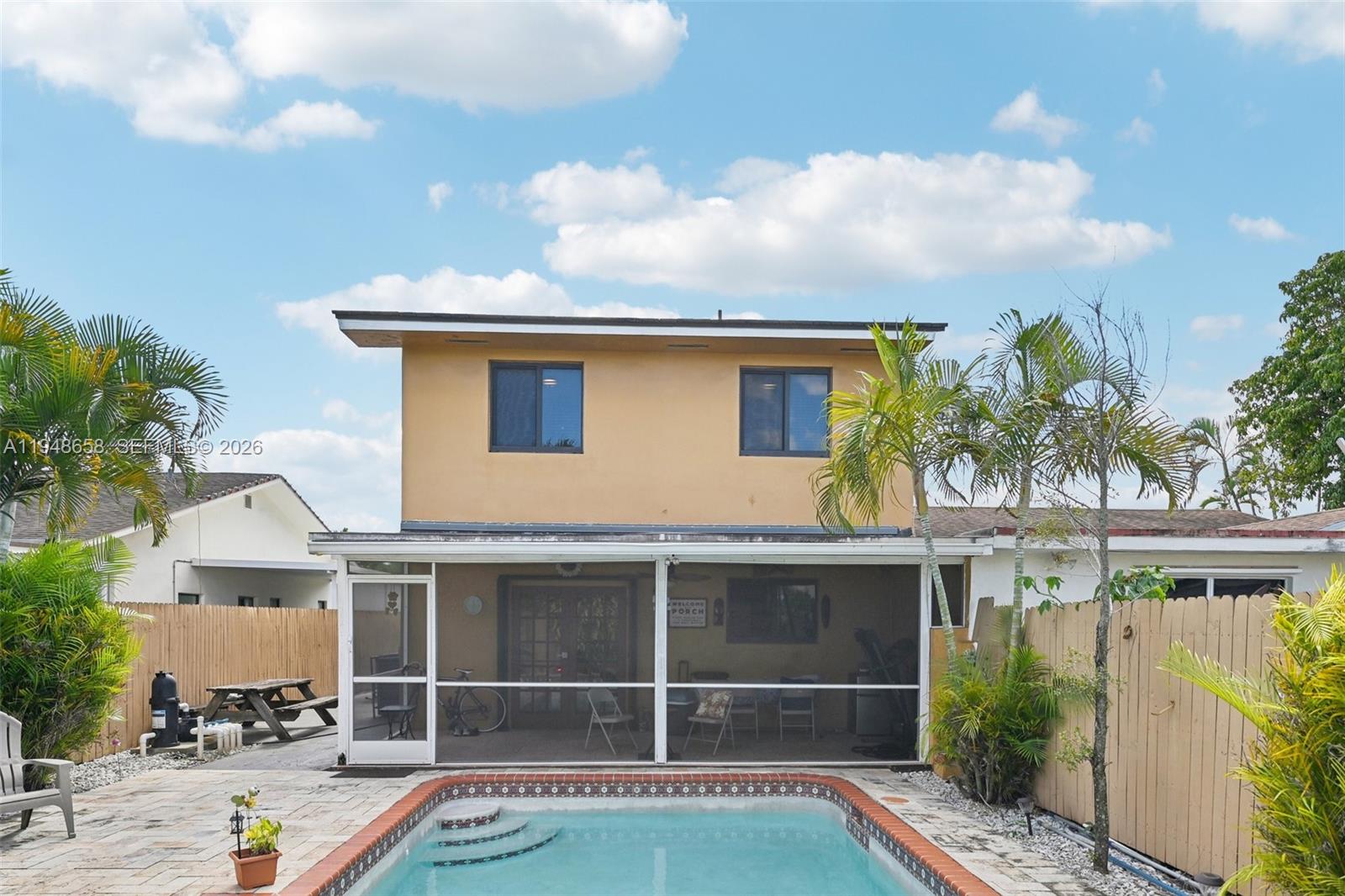 10365 Southwest 11th Terrace, Unit 49B Miami, FL 33174 - Photo 33 of 36 a view of backyard with a garden and plants