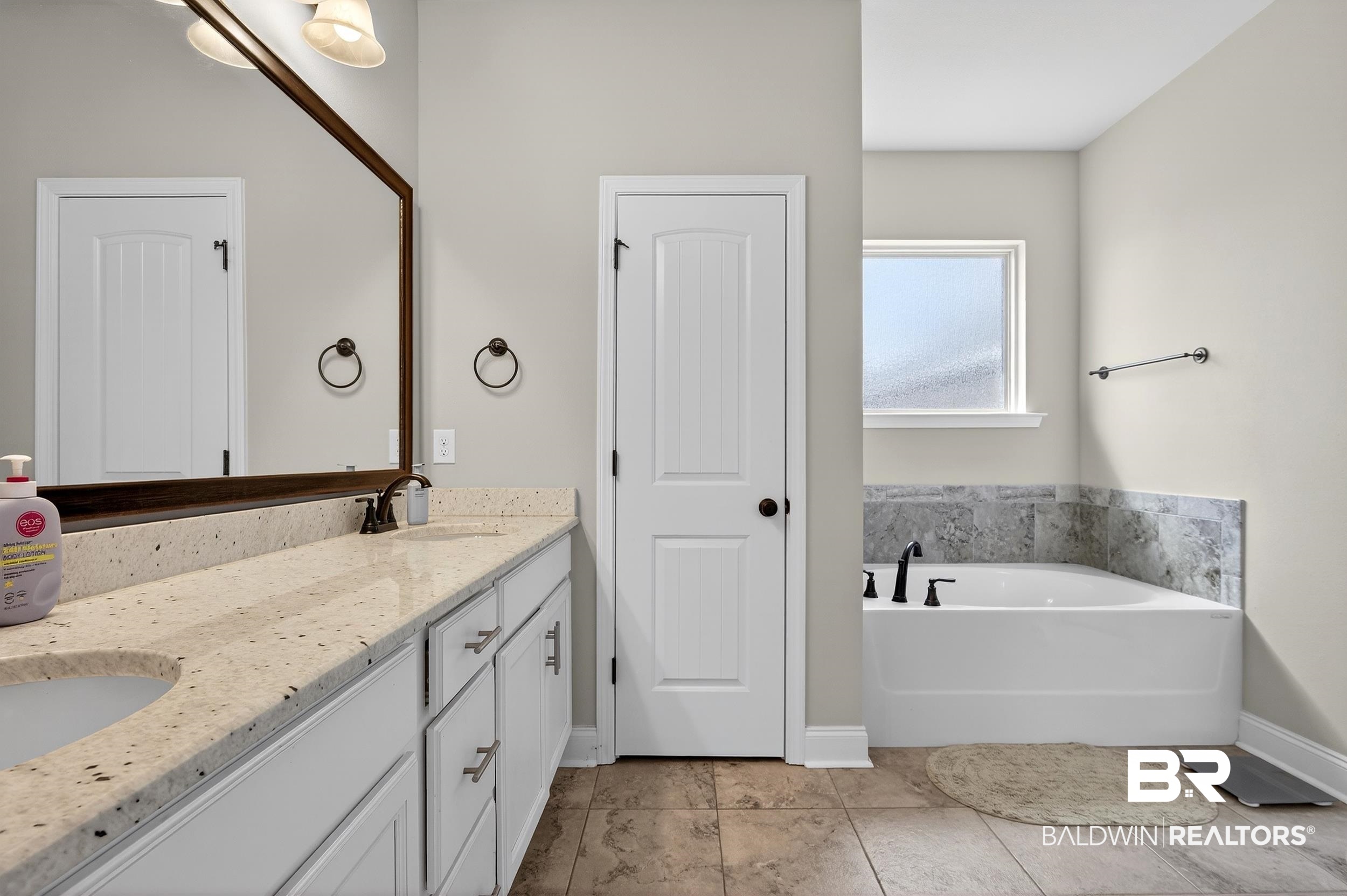 1084 Stella Road Foley, AL 36535 - Photo 18 of 31 Full bath with double vanity and a garden tub