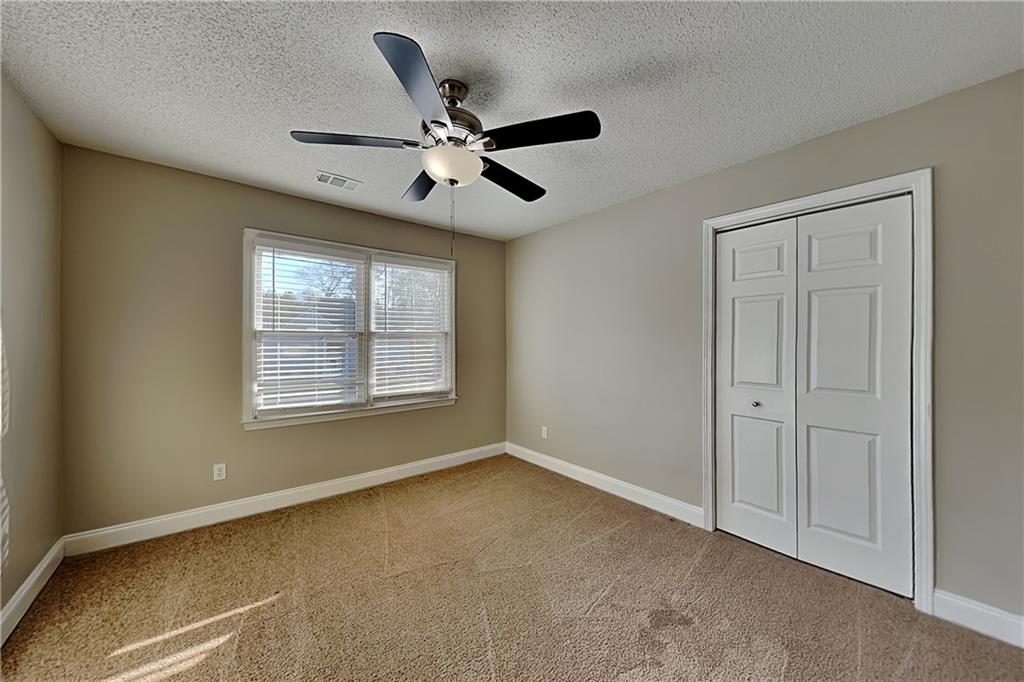 5305 Rutland Court Powder Springs, GA 30127 - Photo 13 of 22 a view of an empty room with a window