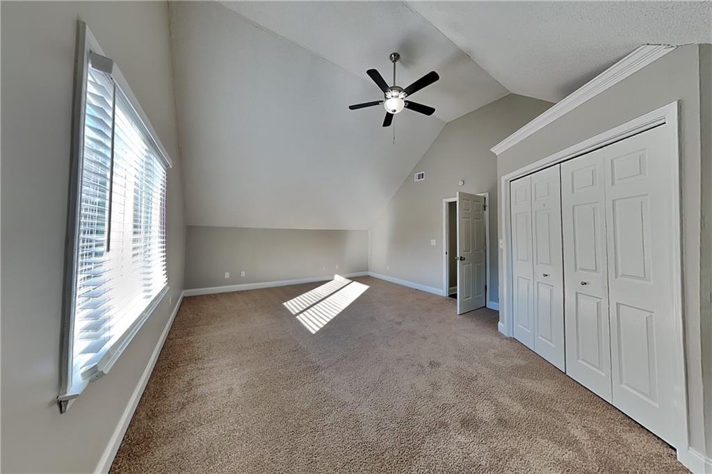 5305 Rutland Court Powder Springs, GA 30127 - Photo 14 of 22 a view of empty room with wooden floor and fan