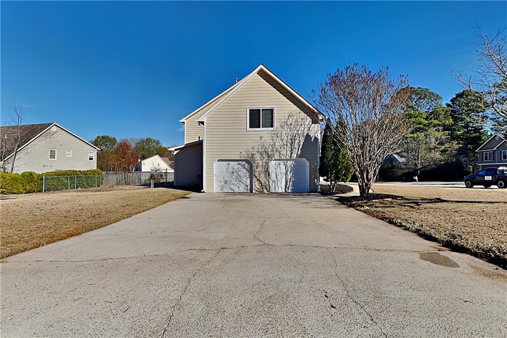 5305 Rutland Court Powder Springs, GA 30127 - Photo 18 of 22 a view of garage and yard