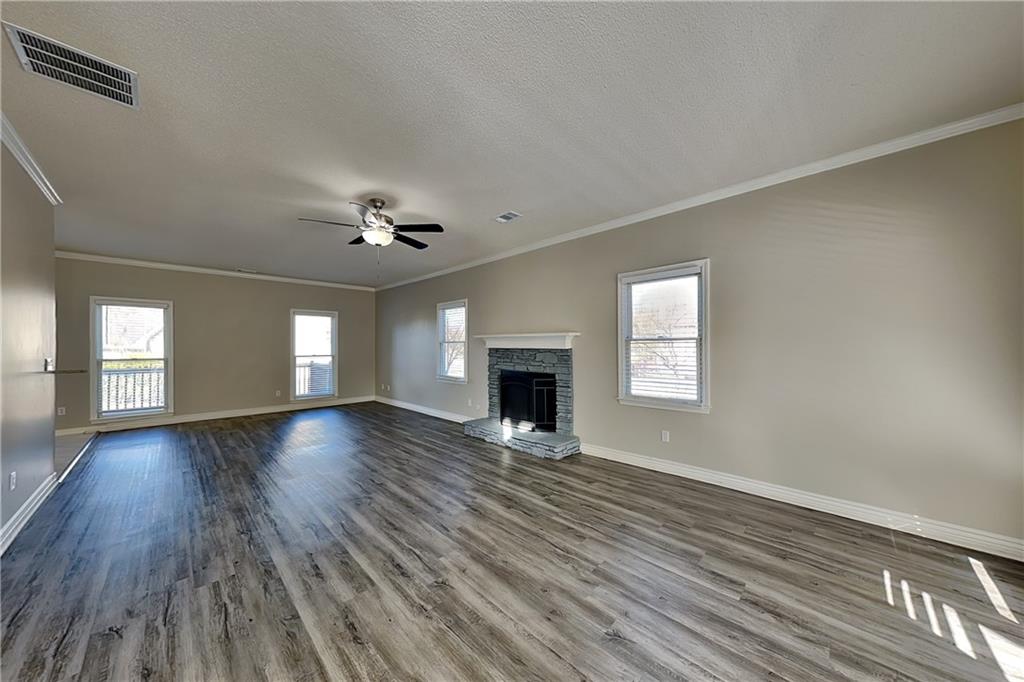 5305 Rutland Court Powder Springs, GA 30127 - Photo 3 of 22 a view of an empty room with window and wooden floor