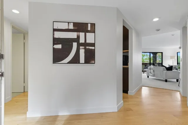 a view of a livingroom with furniture and wooden floor