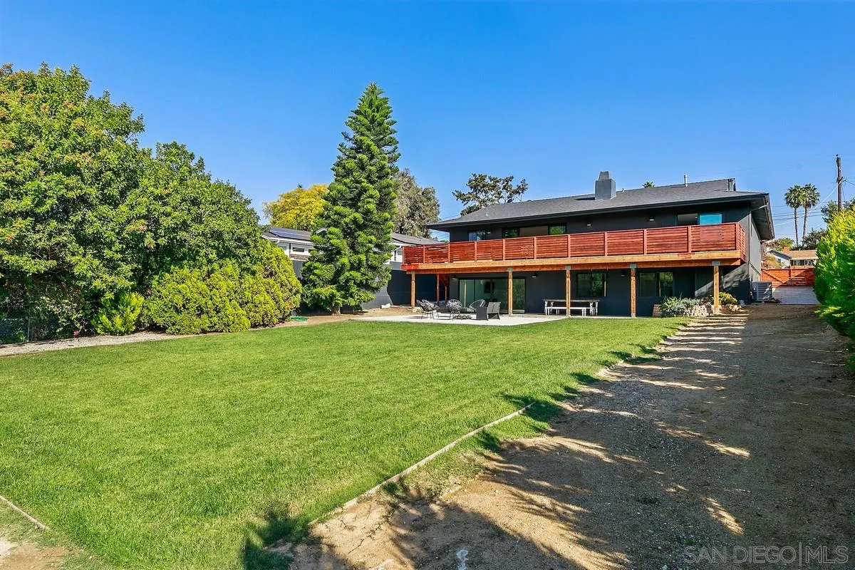 970 Saxony Road Encinitas, CA 92024 - Photo 3 of 39 a front view of a house with a yard