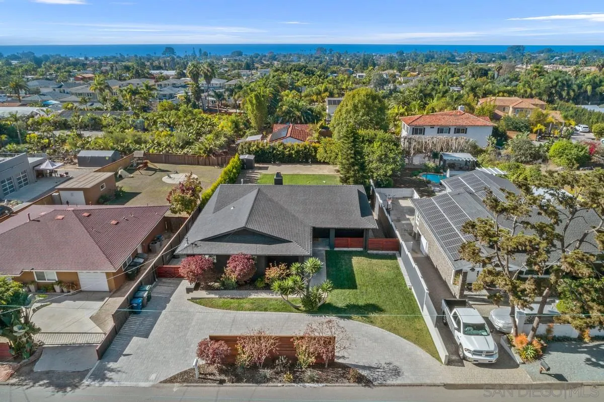 970 Saxony Road Encinitas, CA 92024 - Photo 31 of 39 an aerial view of residential houses with outdoor space and parking