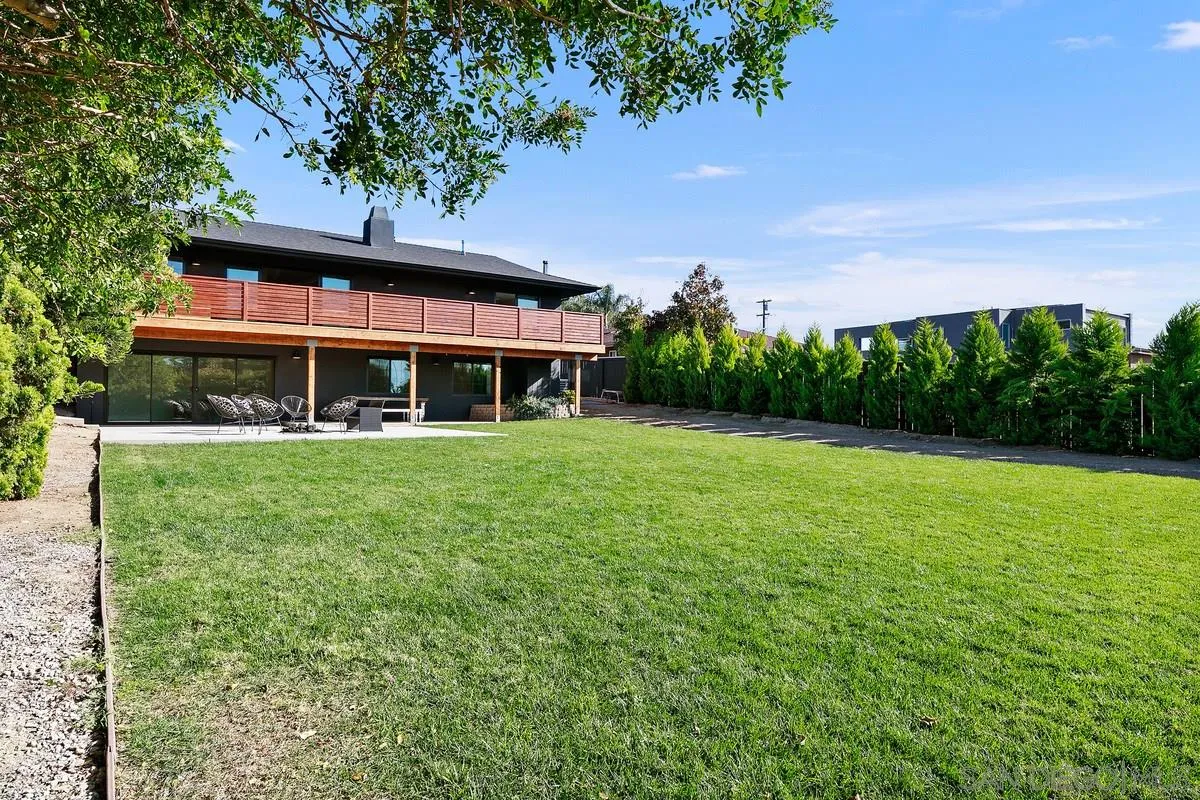 970 Saxony Road Encinitas, CA 92024 - Photo 33 of 39 a view of a house with a yard
