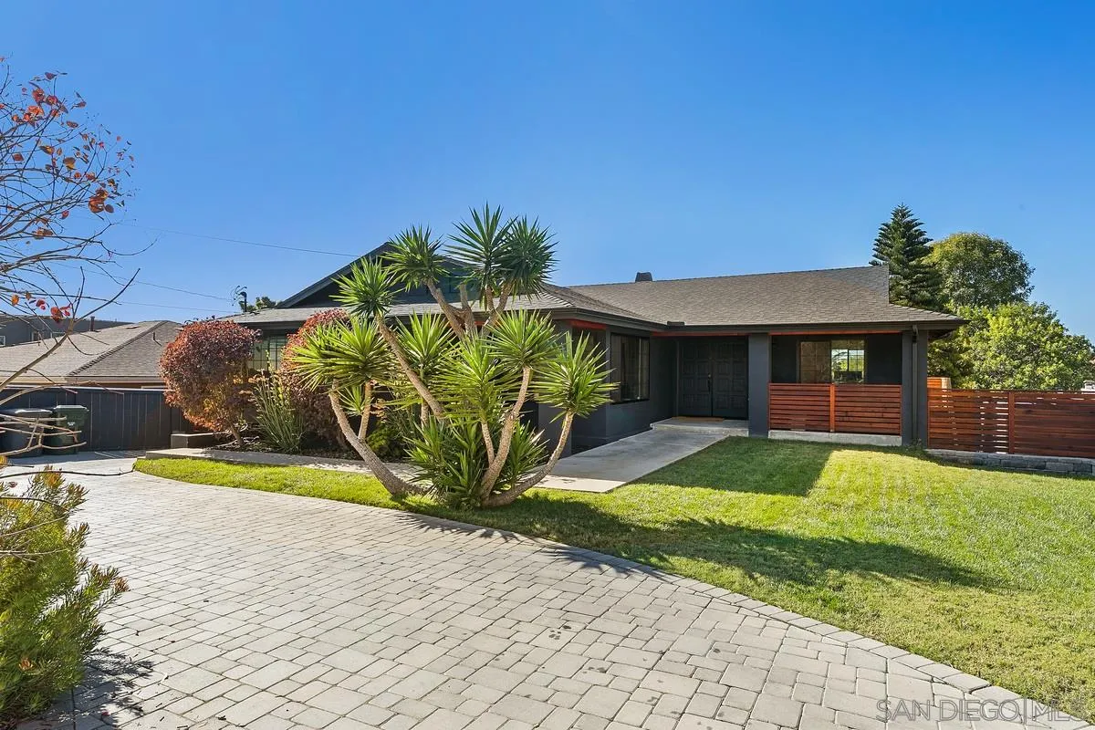 970 Saxony Road Encinitas, CA 92024 - Photo 37 of 39 a view of a house with backyard and sitting area