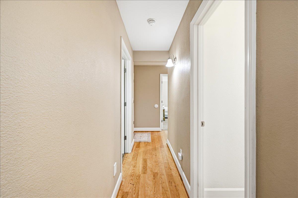 14240 Hollydale Road Grass Valley, CA 95945 - Photo 22 of 53 Main hall to secondary bedrooms and garage